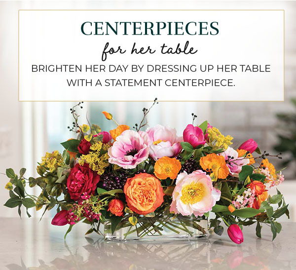 Shop Handcrafted Centerpieces, available at Petals.