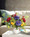 Mixed Ranunculus & Berries Faux Flower Arrangement  in Red and Purple.